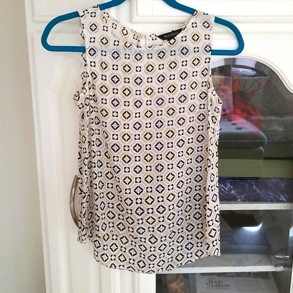 Whitehouse Black Market top